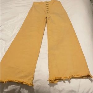 Pilcro high rise wide leg yellow jeans.